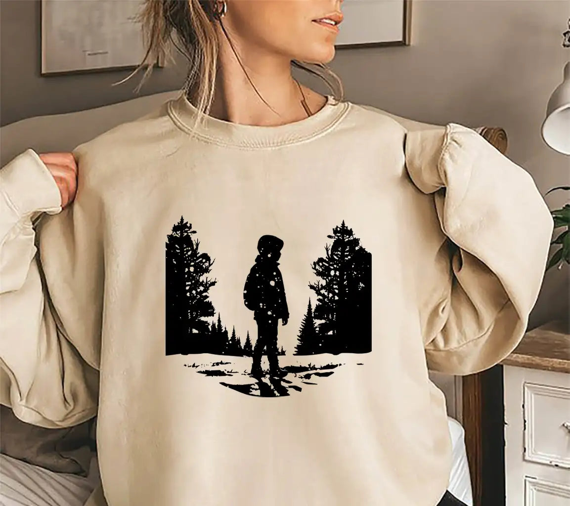 Boy In Snow Covered Field