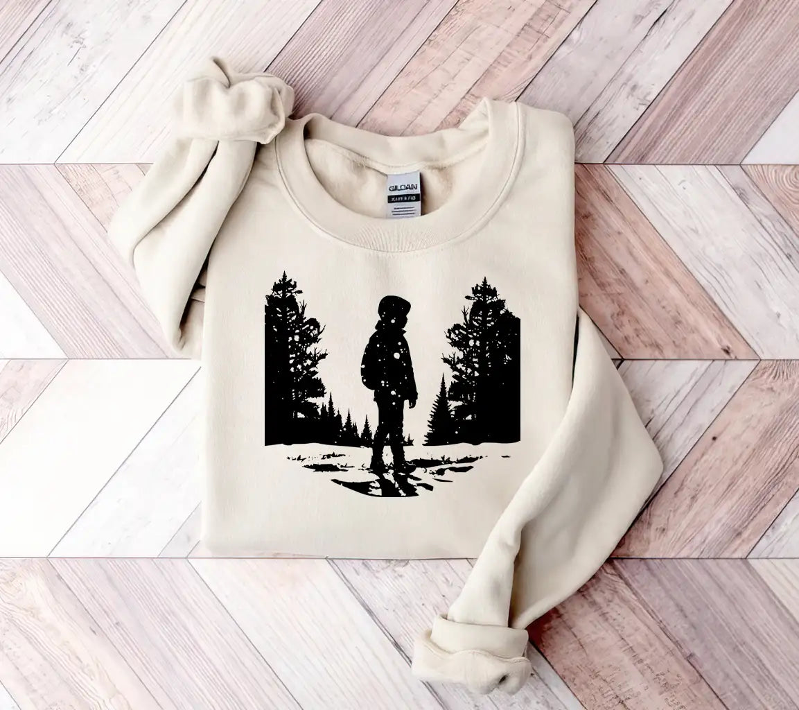 Boy In Snow Covered Field