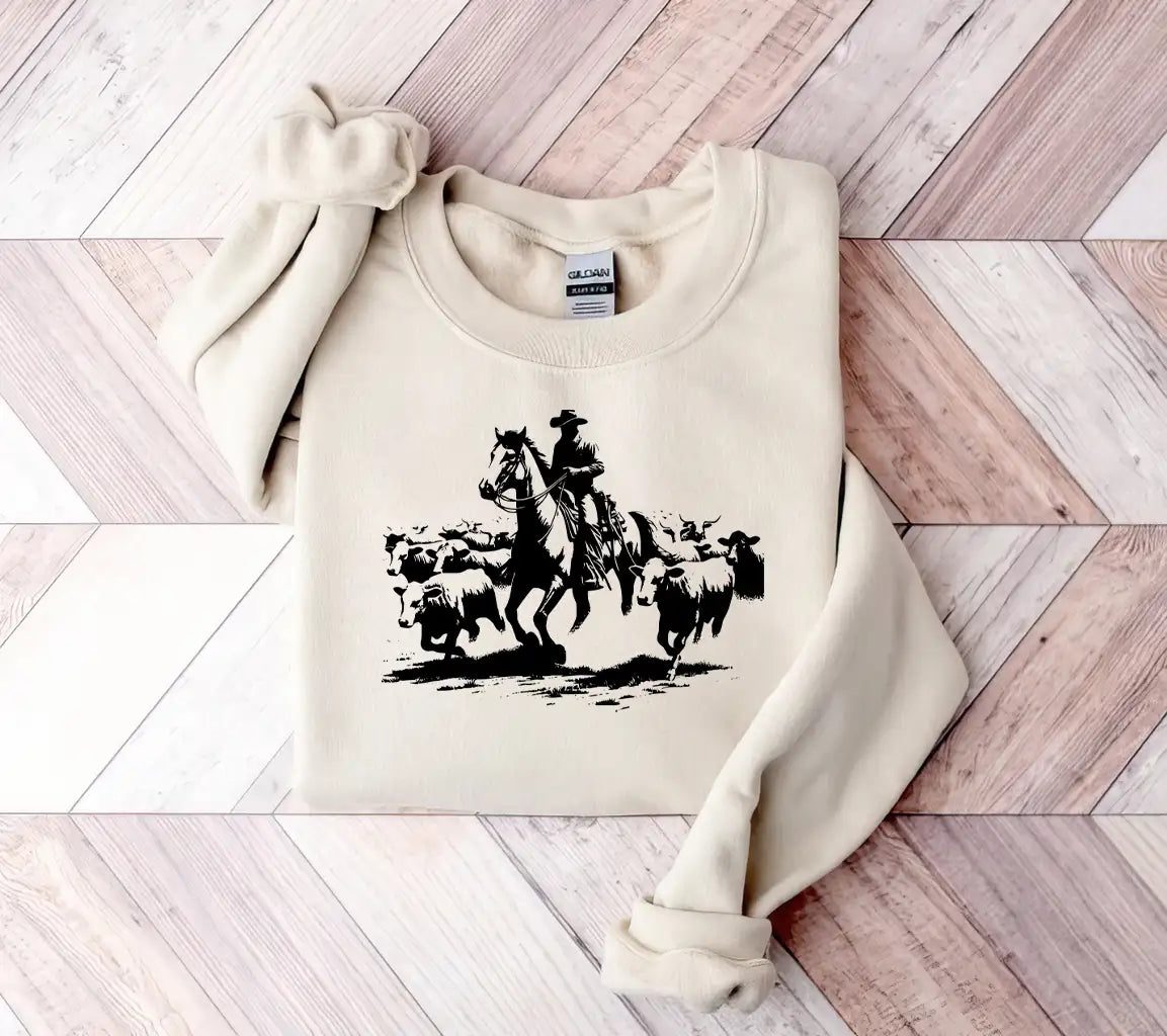 Cowboy Herding Cattle